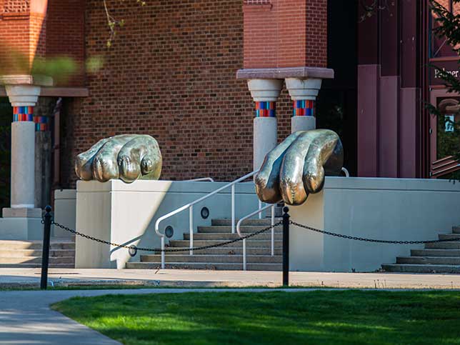 Entrance of Palmer Museum of Art with large paw sculptures