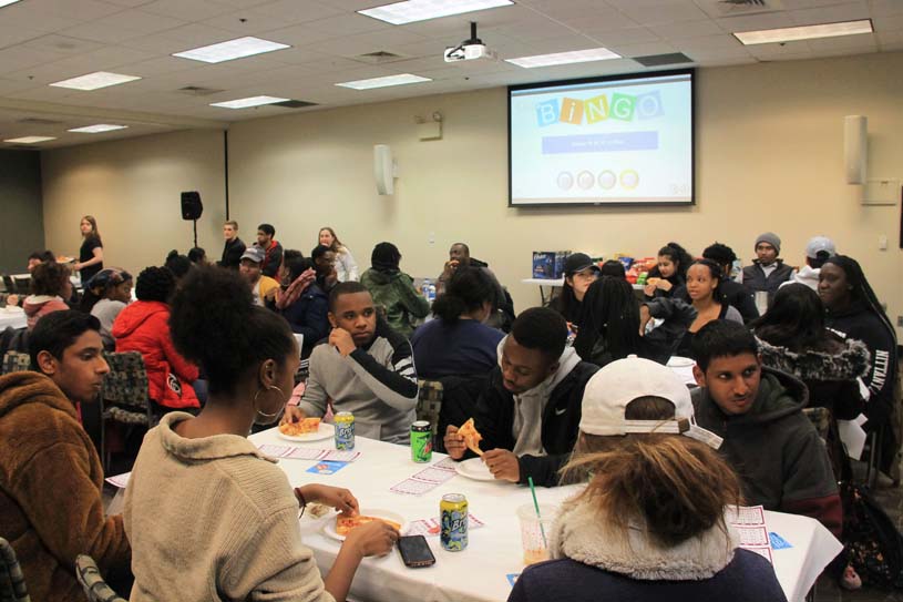 Students play “grocery bingo” in Lares Commons.