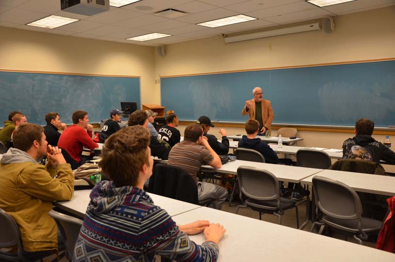 A faculty member teaches a course in communications to a classroom of students at Penn State Altoona.