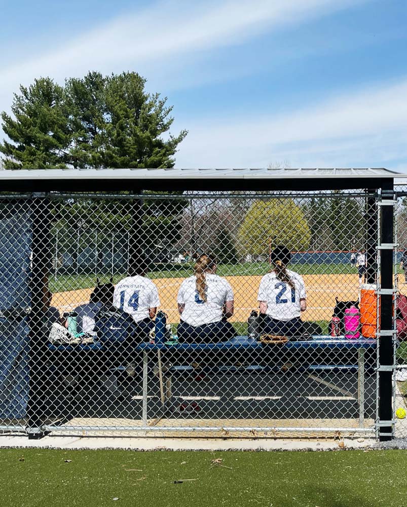 Mont Alto softball players cheer on their teammates during a home game.