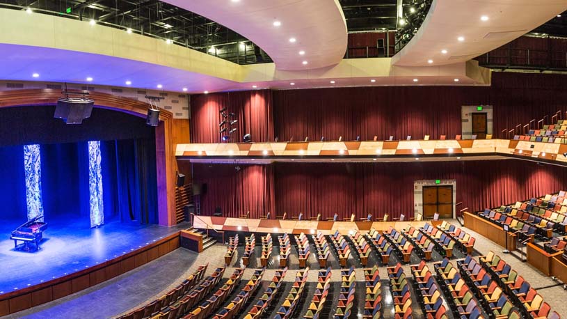 Interior of the Pullo Family Performing Arts Center theatre showing seats and stage on the Penn State York campus.